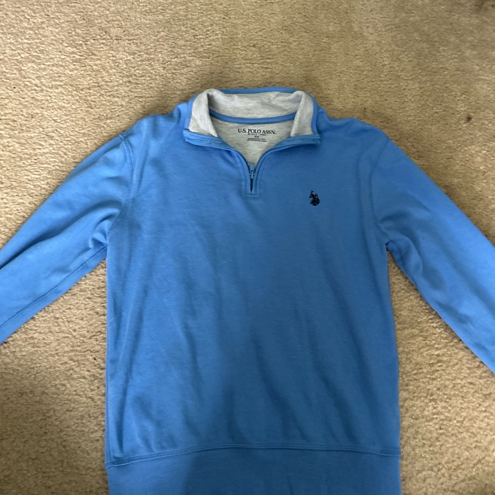 It’s a baby blue it’s a polo brand and a fitted skirt